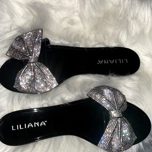 Black jelly rhinestone bow slides